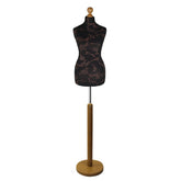 Brown flower on Black Tailors Dummy with a Light Wood Round Stand